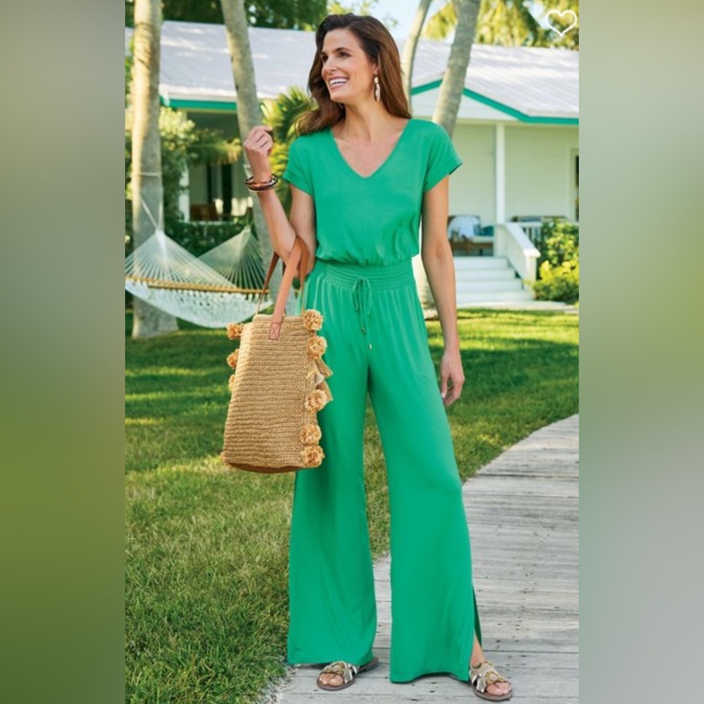 NWT green V-neck jersey jumpsuit. Never worn. Size Medium.